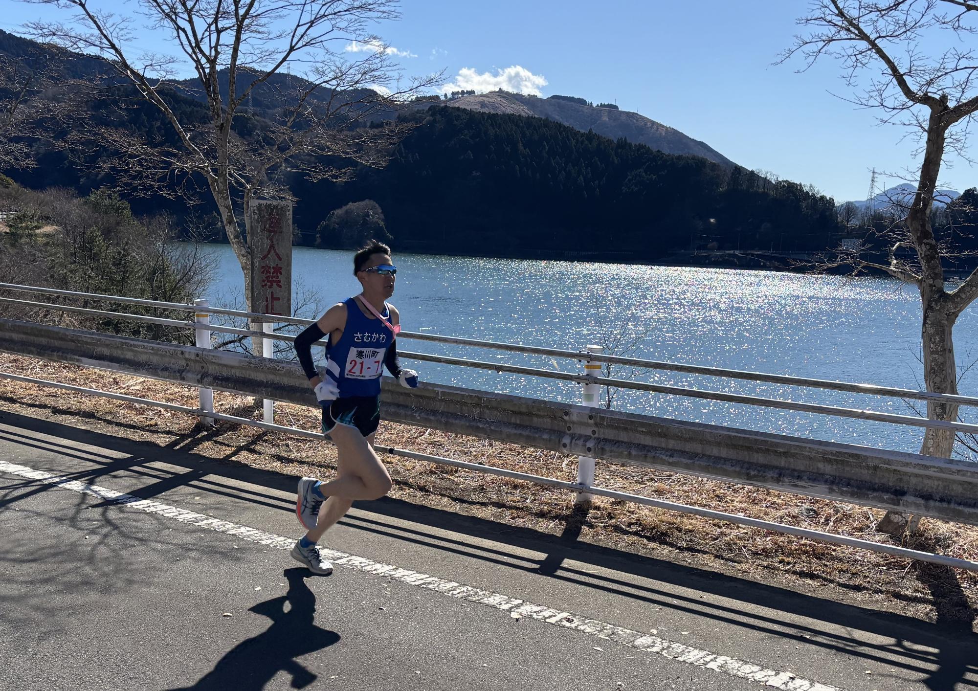 最終区でゴールした竹内選手